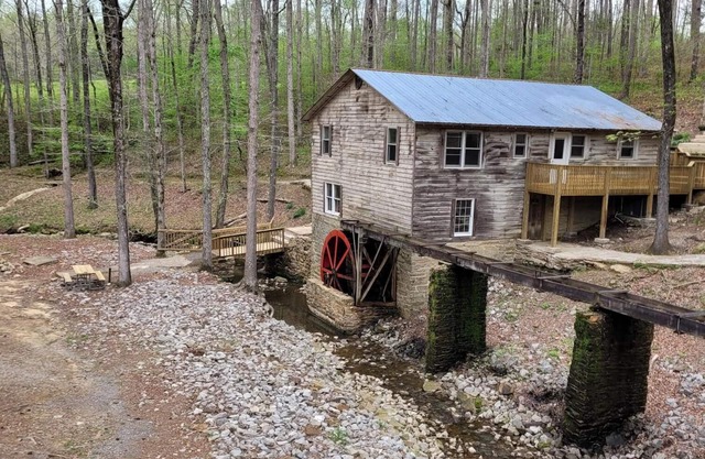Historic Cabin in a natural setting with waterfalls and covered bridge