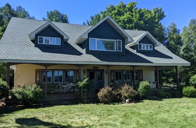 Historic home near Leland. Huge porch, fire pit.