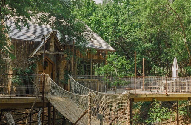 Hobbit Treehouse with waterfall! 350 Acres on the BrazosRiver! "Magical"-FW Mag