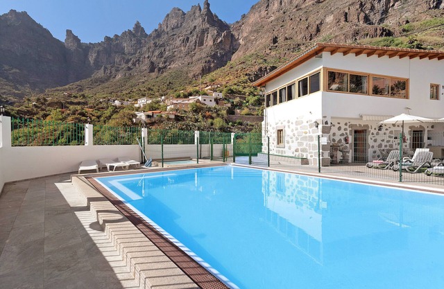 Vivienda Vacacional Risco Blanco con vistas a la montaña, piscina compartida, A/C y Wi-Fi