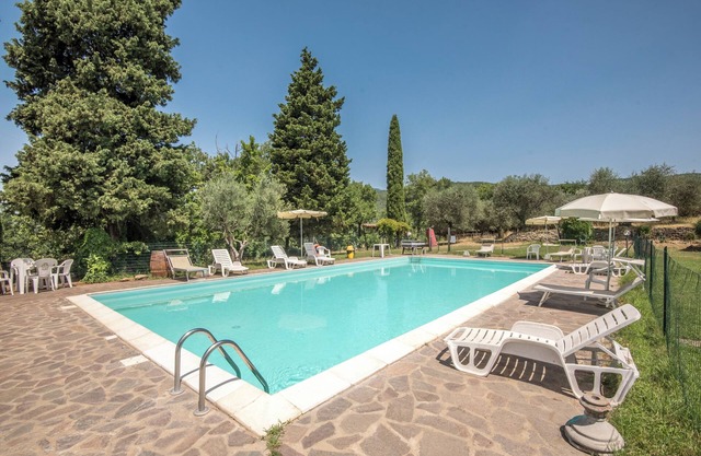 Apartamento vacacional 'Bilocale Brando' con piscina, jardín y Wi-Fi