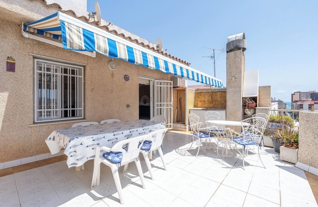 Apartamento vacacional "Ático Cesar Cataldo" cerca de la playa con terraza privada