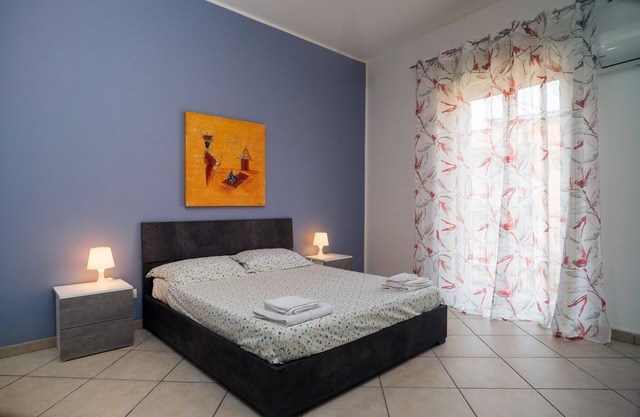 Apartamento vacacional "Casa Cairoli" con balcón y aire acondicionado