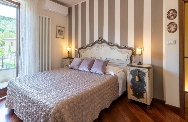 Apartamento vacacional "Casa Le Rose" con vistas a la montaña, terraza privada y Wi-Fi