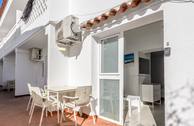 Apartamento vacacional en un complejo bien mantenido con terraza