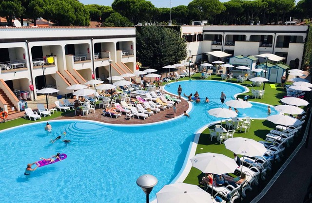 Apartamento vacacional en el resort familiar con una gran piscina para hasta 7 personas