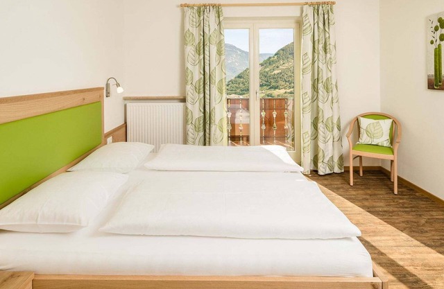 Apartamento vacacional 'Rasnerhof Ferienwohnung Meran' con vistas a la montaña, balcón y Wi-Fi