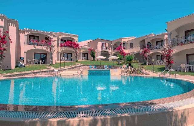 Casa vacacional con aire acondicionado y piscina comunitaria