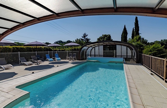 Casa de vacaciones 'Fleurie' con piscina compartida, Wi-Fi y aire acondicionado