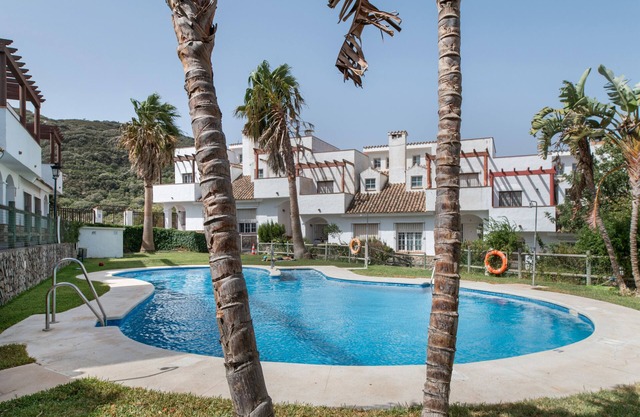 Casa de vacaciones 'Las Lagunetas' con vistas a la montaña, piscina compartida y terraza privada