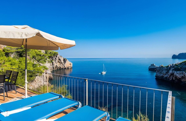 Casa de vacaciones 'Cala Deia' con vistas al mar, Wi-Fi y aire acondicionado