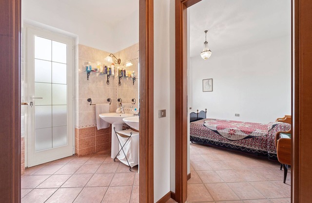 Casa de vacaciones 'Casa del Vento 2' con jardín compartido y aire acondicionado