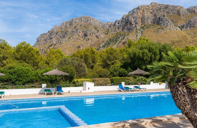 Casa de vacaciones 'Casa Stevens' con vistas al mar, piscina compartida y Wi-Fi