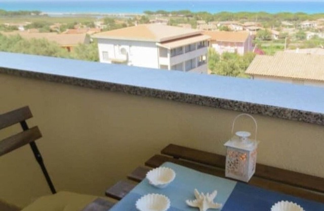 Casa de vacaciones 'Casa Vacanza Sa Petra Ruja B' con vistas al mar, balcón y aire acondicionado