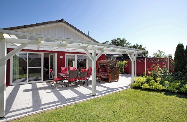 Casa de vacaciones 'Ferienhaus Frida Am Deich' con terraza privada, jardín privado y Wi-Fi