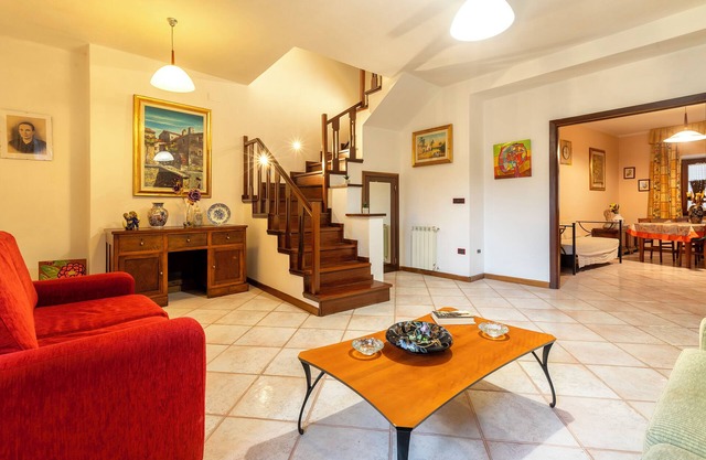 Casa de vacaciones 'Delle Fate' con vistas a la montaña, jardín privado y aire acondicionado