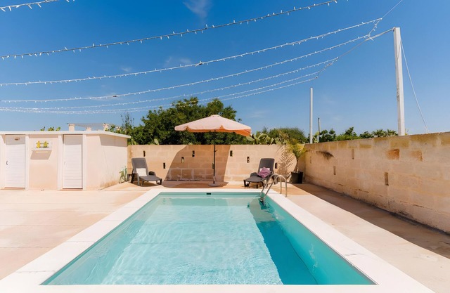 Casa de vacaciones 'Dilauro Con Piscina 1' con piscina compartida, terraza y aire acondicionado