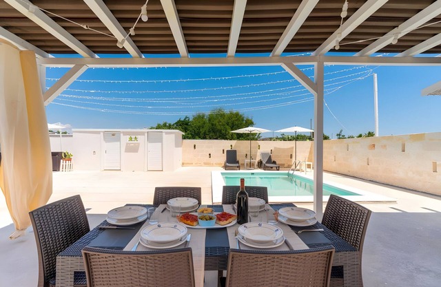 Casa de vacaciones 'Dilauro Con Piscina 2' con piscina compartida, terraza y aire acondicionado