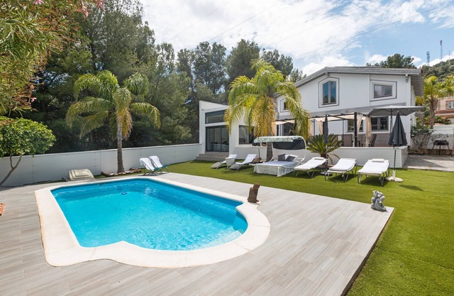 Casa de vacaciones 'Palmera' con vistas a la montaña, Wi-Fi y aire acondicionado