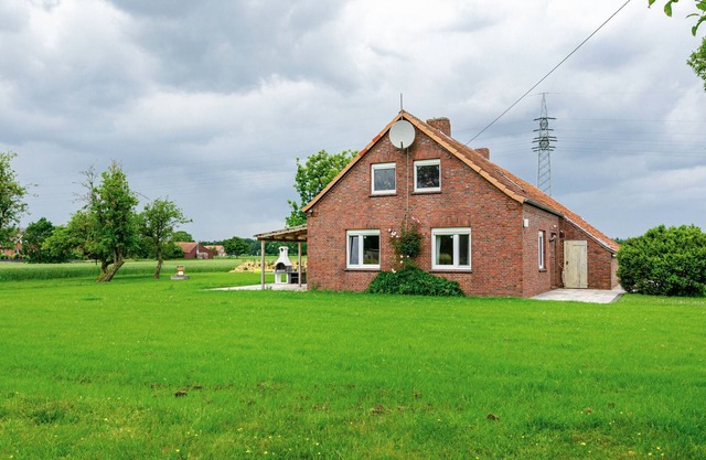 Casa de vacaciones 'Ferienhaus Lüttje Dörp' con terraza privada, jardín privado y wifi