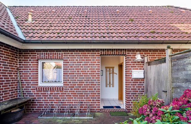 Casa de vacaciones 'Ferienhaus Inselkate' con terraza privada, jardín privado y Wi-Fi