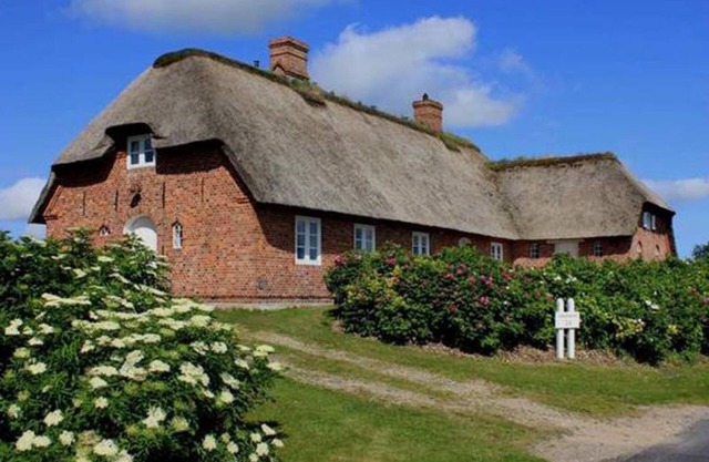 Casa de vacaciones 'Friesenhaus Hörn' con terraza privada, jardín privado y Wi-Fi