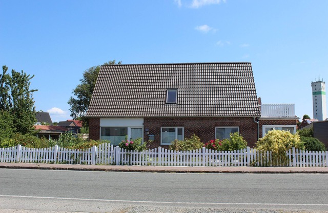 Casa de vacaciones 'Haushälfte Am Süderhafen' con terraza privada, jardín privado y Wi-Fi