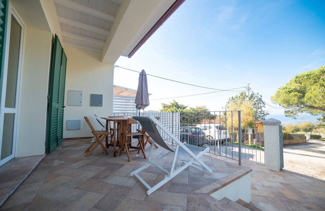 Casa de vacaciones 'Il Timo' con vistas al mar, Wi-Fi y aire acondicionado