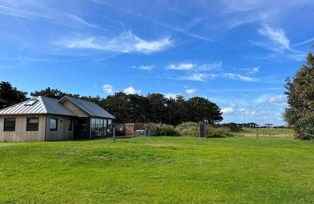Hermosa casa de vacaciones con huerto privado