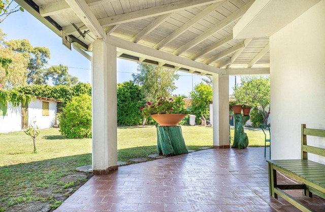 Casa de vacaciones 'Giardino Del Melograno' con terraza privada, Wi-Fi y aire acondicionado