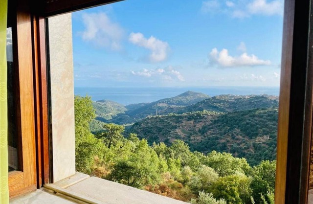 Casa de vacaciones 'Villa Loretta' con vistas al mar, terraza privada y jardín privado