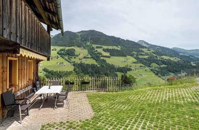 Casa de vacaciones "Knusperhäuschen Höfen-Hüsle" con vistas a la montaña