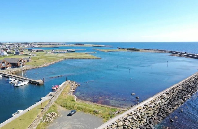 Holiday home 'Lista Maritim 6', built 2021, at the guest harbor in Borhaug-Borshavn near Farsund, Listafjorden, southern Norway, 7+2 persons, 135 m² living space, new terrace coming for the 2024 season, panoramic windows and south-facing balcony.