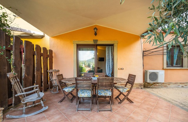 Casa de vacaciones 'L'olivo' con terraza privada, jardín privado y aire acondicionado