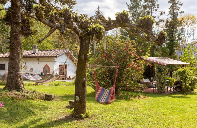 Casa de vacaciones 'La Capannina' con vistas a la montaña, terraza privada y jardín privado
