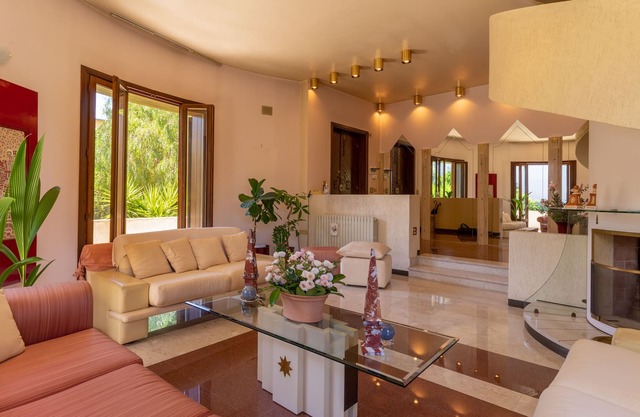 Casa de vacaciones 'La tua Oasi' con terraza privada y jardín