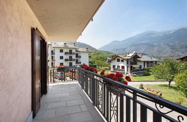 Casa de vacaciones 'Le Cré Appartamento 5' con vistas a la montaña, jardín compartido y Wi-Fi