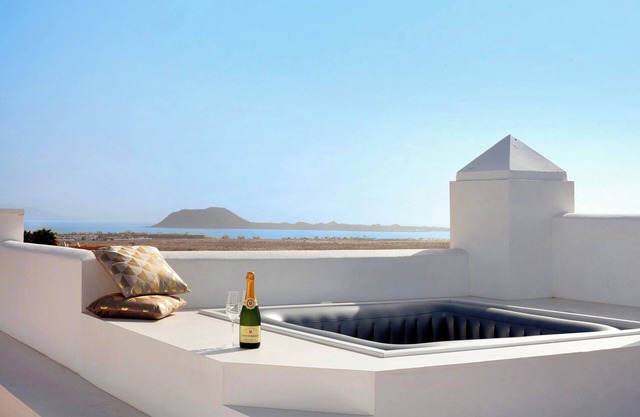 Casa de vacaciones 'Luxury Ocean View' con vistas al mar y piscina compartida