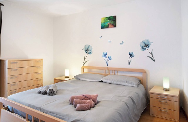 Casa de vacaciones 'Oasi Alpina' con vistas a la montaña, jardín privado y balcón