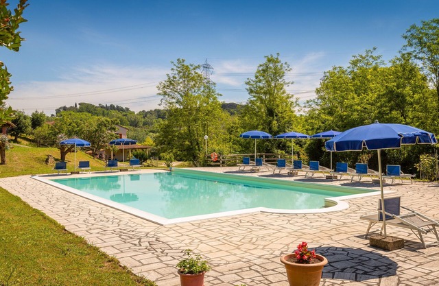 Casa de vacaciones 'Poggio4' con piscina compartida, terraza privada y Wi-Fi