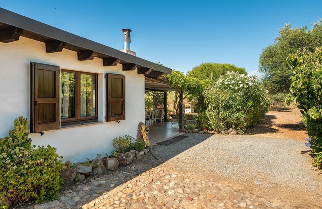 Casa de vacaciones 'Pretty House' con terraza privada, Wi-Fi y aire acondicionado