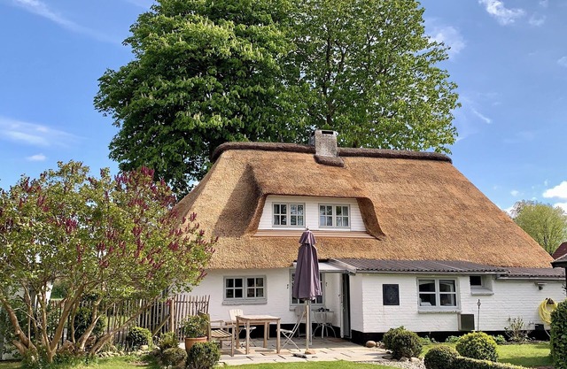 Casa de vacaciones 'Ferienhaus Tade Bo' con terraza privada, jardín privado y Wi-Fi