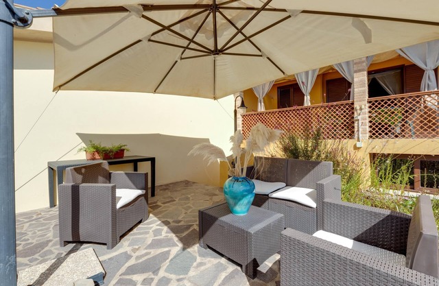 Casa de vacaciones Taverna Albachiara 49 B con vistas al mar, terraza y Wi-Fi