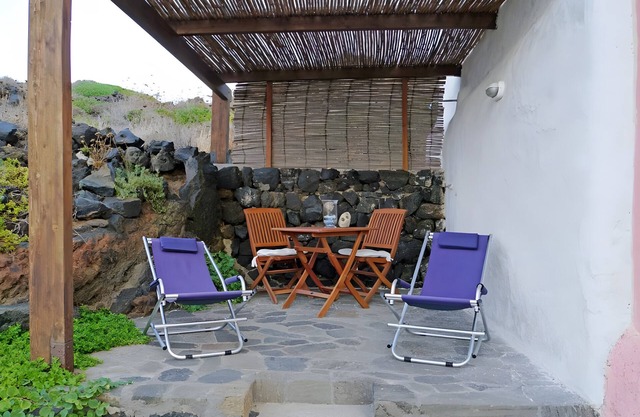 Casa de vacaciones 'Terra E Mare' con vistas al mar, terraza compartida y aire acondicionado
