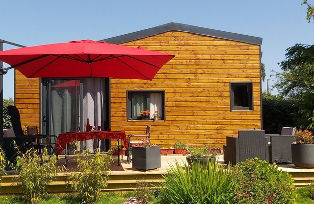 Casa de vacaciones "Tiny House" con terraza privada y jardín compartido