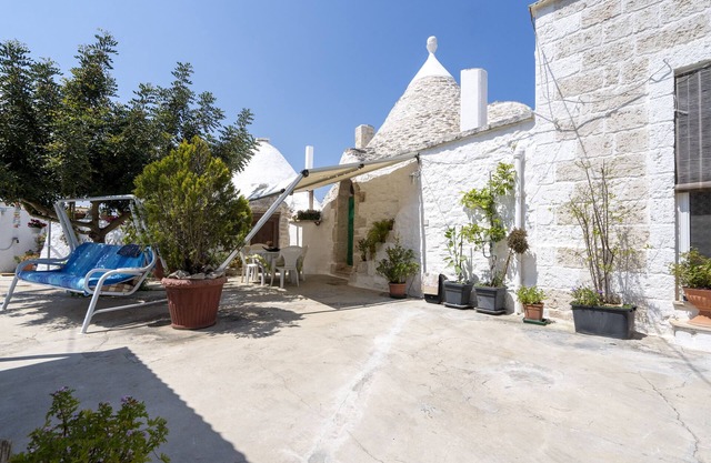 Casa de vacaciones 'Trullo Antica Pietra' con terraza privada, jardín privado y aire acondicionado