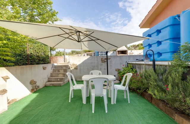 Casa de vacaciones "Villetta Albachiara 49 B" con vistas al mar, jardín y aire acondicionado