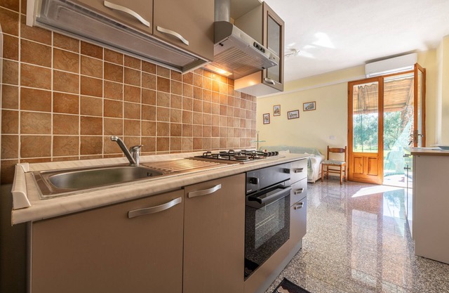 Casa de vacaciones 'Villetta Immersa Nella Natura' con vistas al mar y A/C