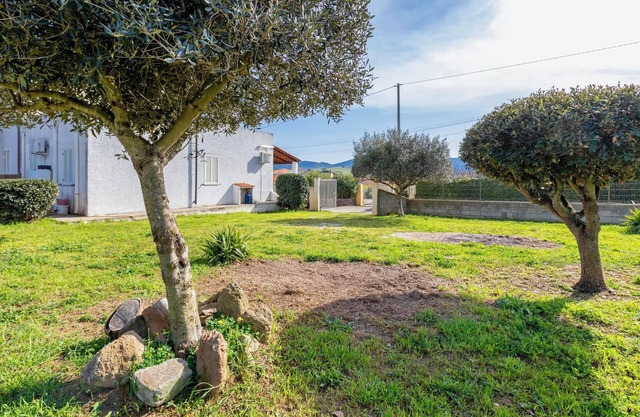 Casa de vacaciones 'Villetta I Pitosfori' con terraza, jardín y Wi-Fi