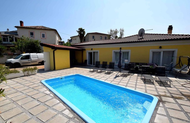Casa vacacional con patio, aire acondicionado